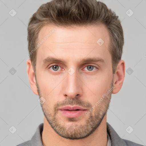 Neutral white young-adult male with short  brown hair and grey eyes