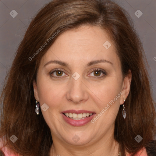 Joyful white adult female with long  brown hair and brown eyes