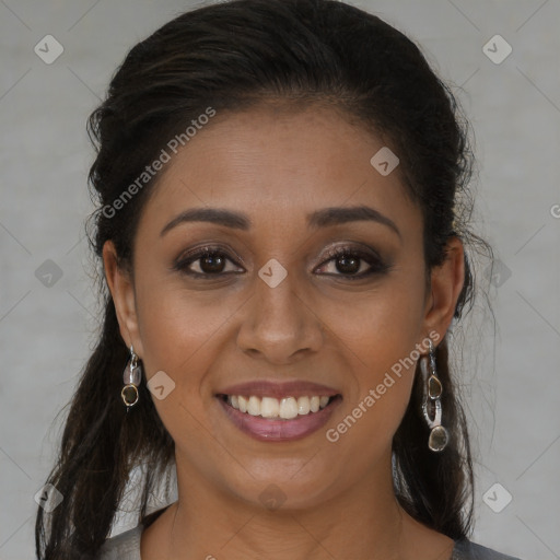 Joyful latino young-adult female with medium  brown hair and brown eyes