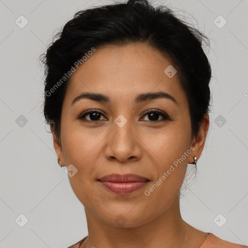 Joyful latino young-adult female with short  brown hair and brown eyes