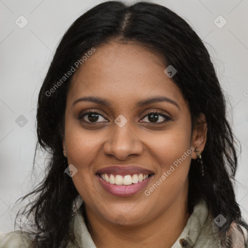 Joyful black young-adult female with long  brown hair and brown eyes