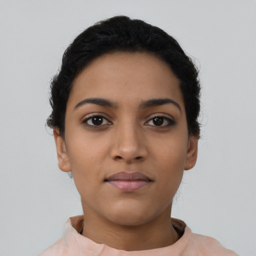 Neutral latino young-adult female with short  black hair and brown eyes