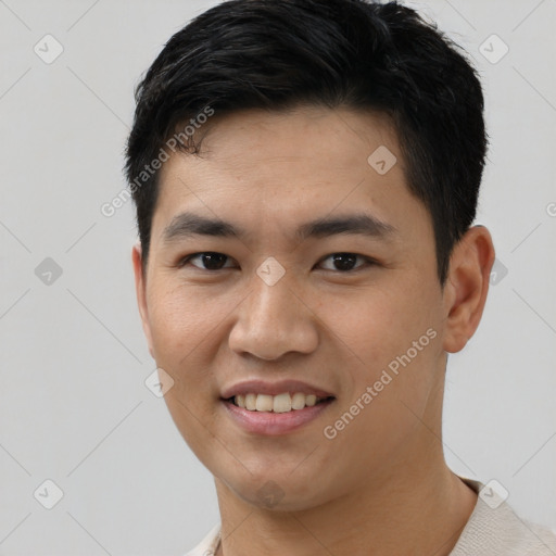 Joyful white young-adult male with short  black hair and brown eyes