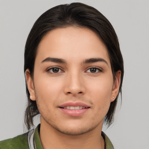 Joyful white young-adult female with medium  black hair and brown eyes