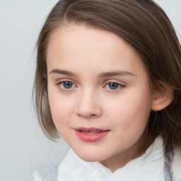 Joyful white child female with medium  brown hair and grey eyes