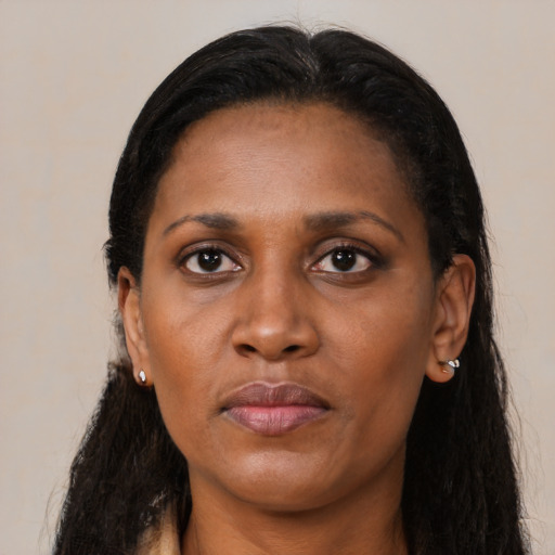 Neutral black adult female with long  black hair and brown eyes