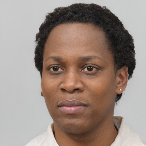 Neutral black young-adult female with short  black hair and brown eyes
