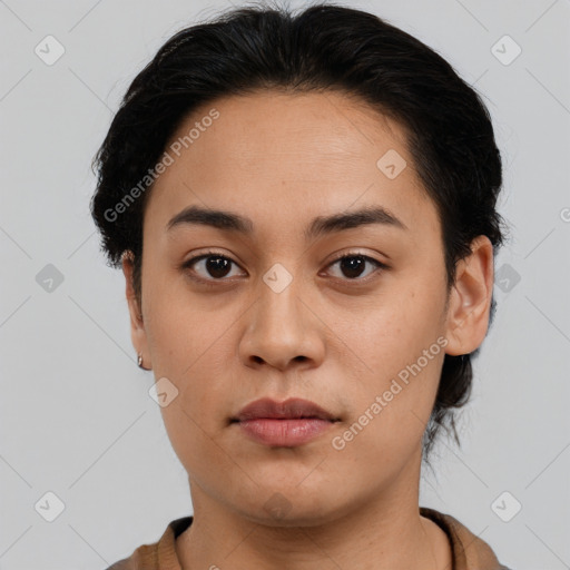 Neutral latino young-adult female with short  black hair and brown eyes