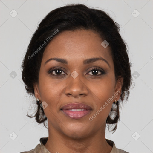 Joyful black young-adult female with medium  brown hair and brown eyes