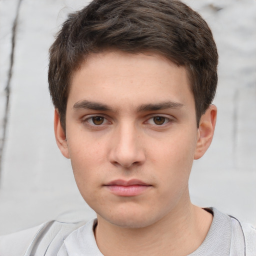 Neutral white young-adult male with short  brown hair and brown eyes