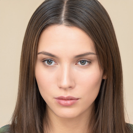 Neutral white young-adult female with long  brown hair and brown eyes