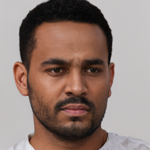 Neutral black young-adult male with short  black hair and brown eyes