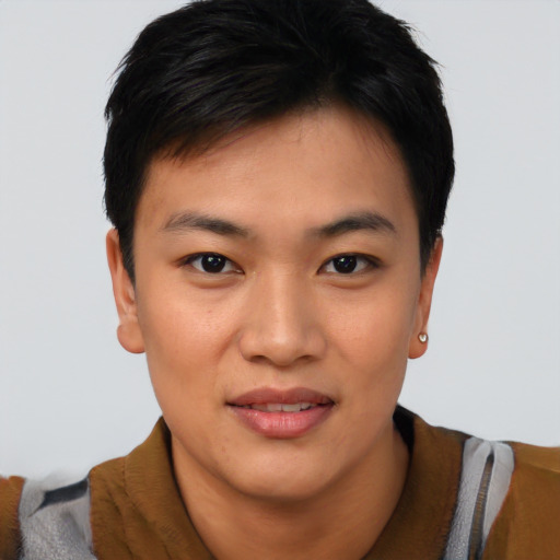 Joyful asian young-adult female with short  black hair and brown eyes