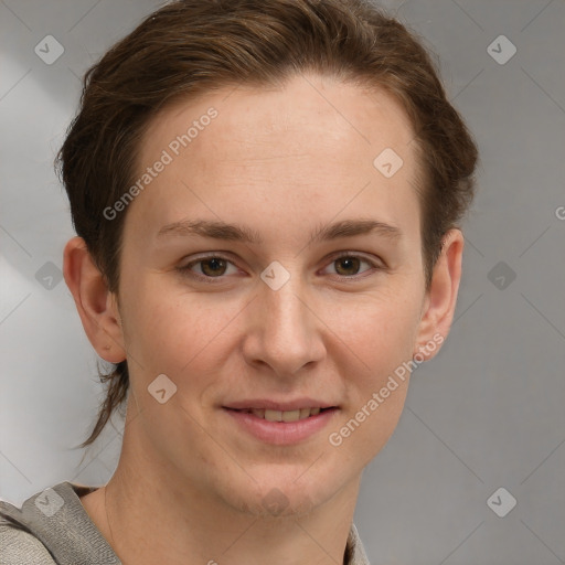 Joyful white young-adult female with short  brown hair and grey eyes