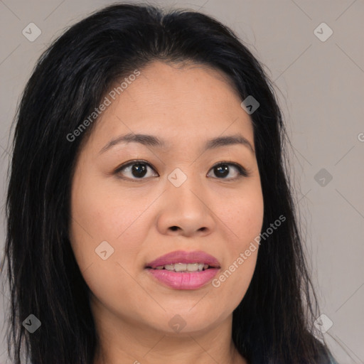 Joyful asian young-adult female with long  brown hair and brown eyes