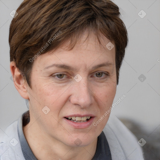 Joyful white adult female with short  brown hair and brown eyes