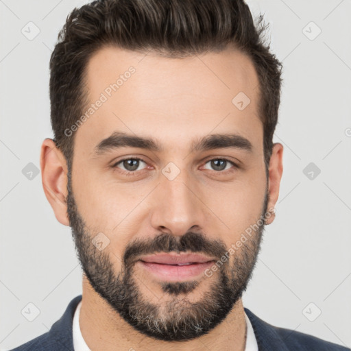 Joyful white young-adult male with short  black hair and brown eyes