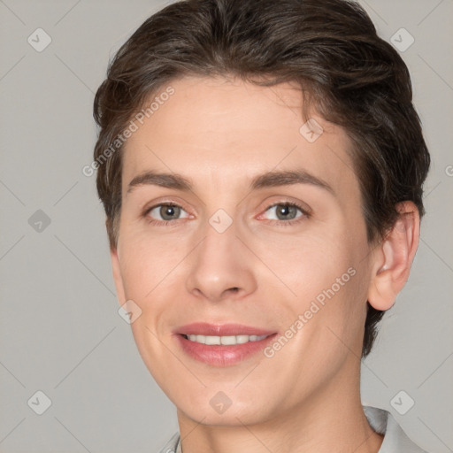 Joyful white adult female with short  brown hair and brown eyes