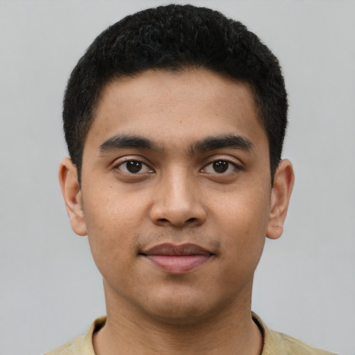 Neutral latino young-adult male with short  black hair and brown eyes
