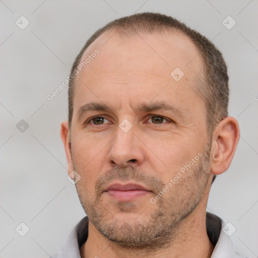 Neutral white adult male with short  brown hair and brown eyes