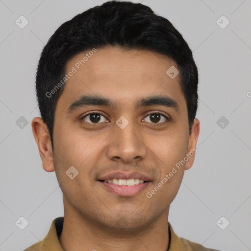 Joyful latino young-adult male with short  black hair and brown eyes