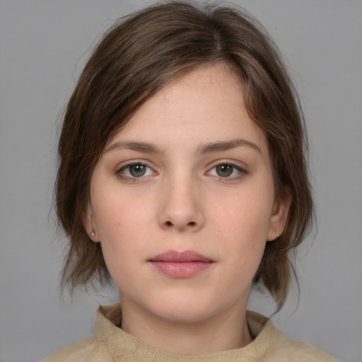 Neutral white young-adult female with medium  brown hair and brown eyes