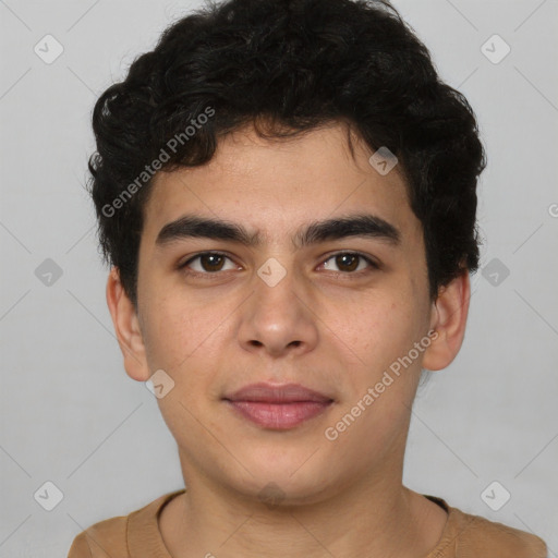 Joyful latino young-adult male with short  brown hair and brown eyes