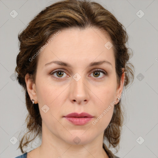 Joyful white young-adult female with medium  brown hair and green eyes