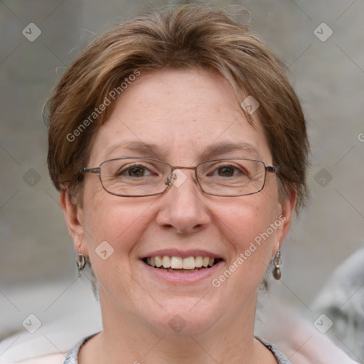 Joyful white adult female with short  brown hair and grey eyes