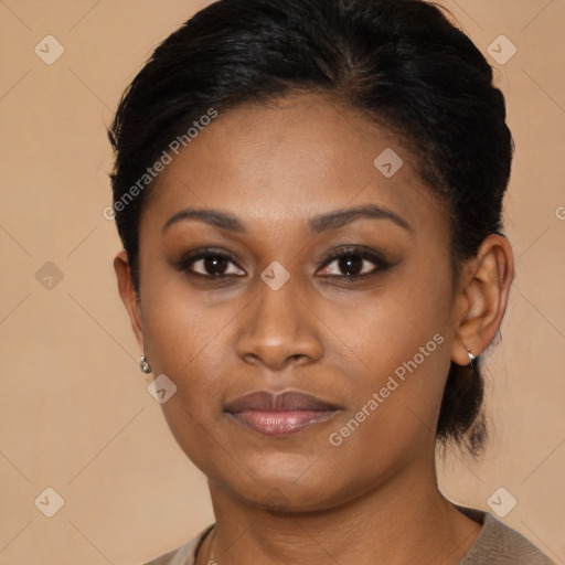 Joyful black young-adult female with medium  brown hair and brown eyes