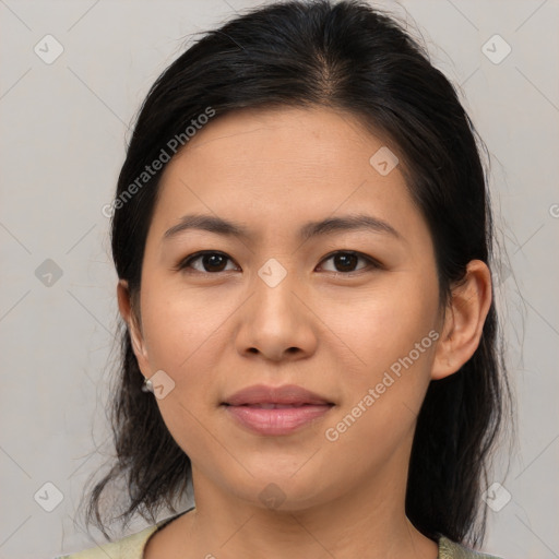 Joyful asian young-adult female with medium  brown hair and brown eyes