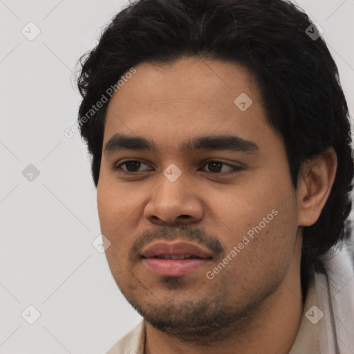 Joyful asian young-adult male with short  black hair and brown eyes