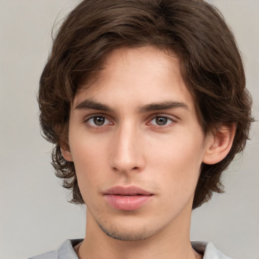 Neutral white young-adult male with medium  brown hair and brown eyes