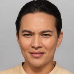 Joyful white adult female with short  brown hair and brown eyes
