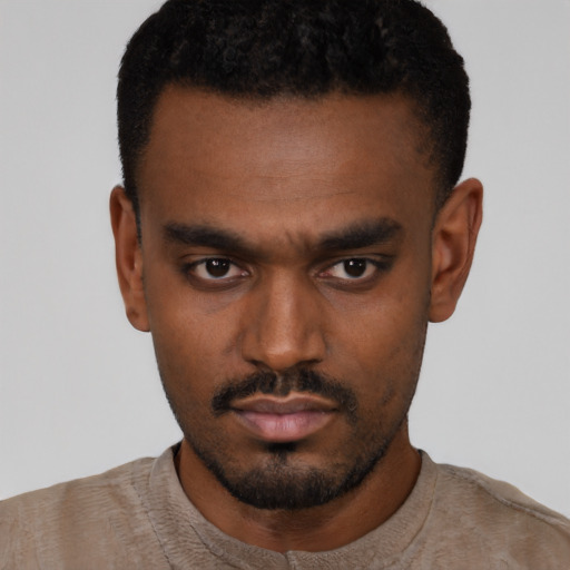 Neutral black young-adult male with short  black hair and brown eyes