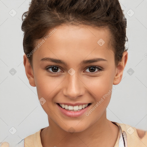 Joyful white child female with short  brown hair and brown eyes