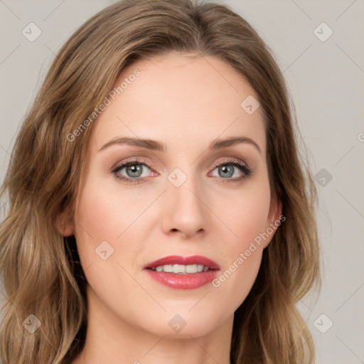 Joyful white young-adult female with long  brown hair and green eyes