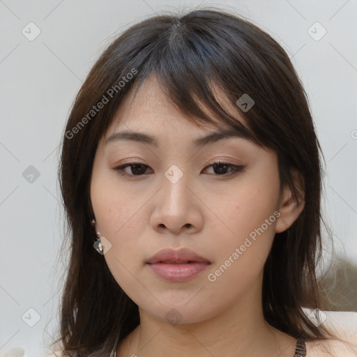 Neutral asian young-adult female with medium  brown hair and brown eyes