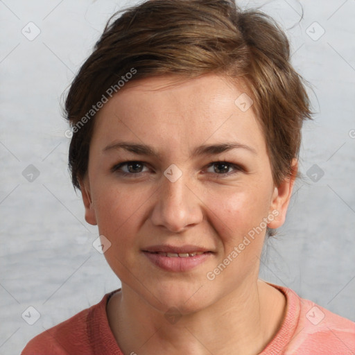 Joyful white young-adult female with short  brown hair and grey eyes