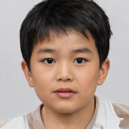 Neutral asian child male with short  brown hair and brown eyes