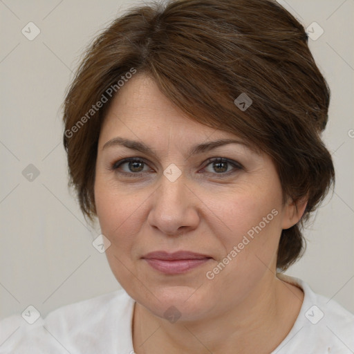 Joyful white adult female with medium  brown hair and brown eyes