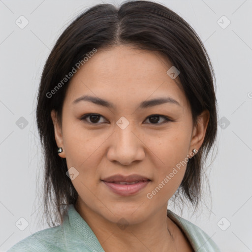 Joyful asian young-adult female with medium  brown hair and brown eyes