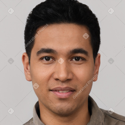 Joyful latino young-adult male with short  black hair and brown eyes