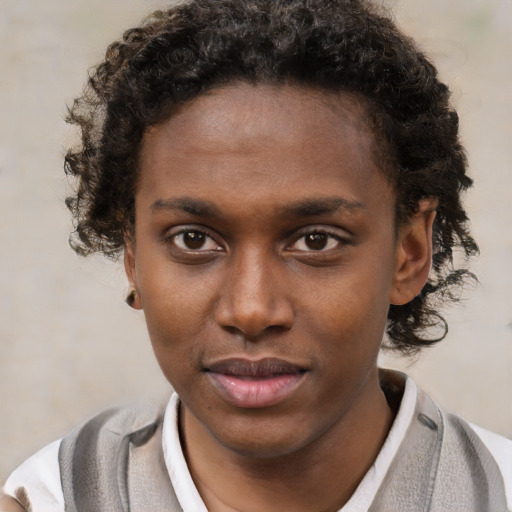 Neutral black young-adult female with short  brown hair and brown eyes