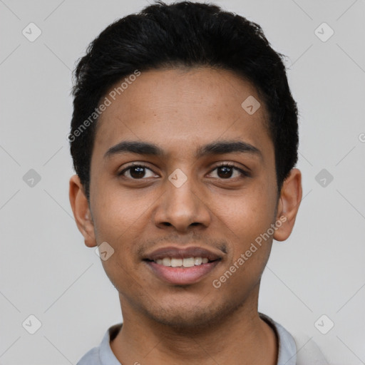 Joyful latino young-adult male with short  black hair and brown eyes