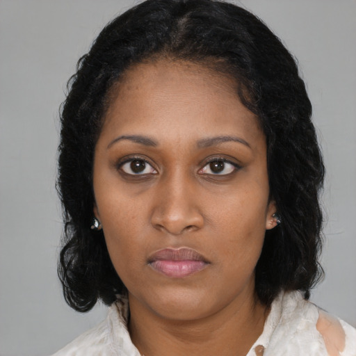 Neutral black young-adult female with medium  black hair and brown eyes