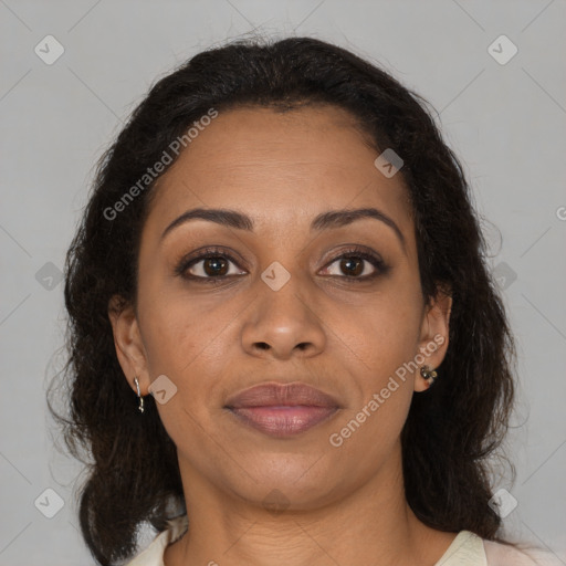 Joyful black adult female with medium  brown hair and brown eyes