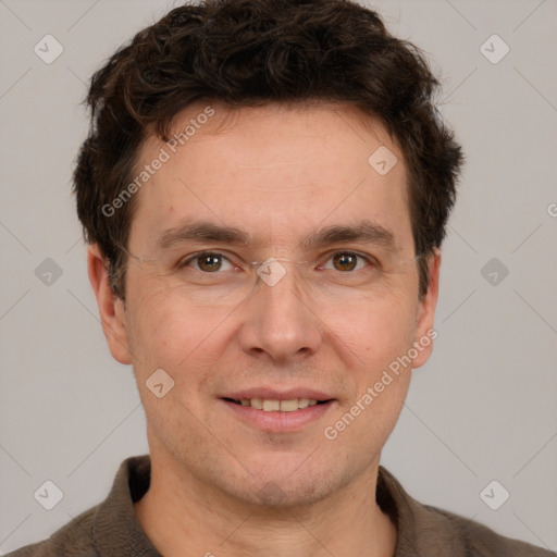 Joyful white adult male with short  brown hair and grey eyes