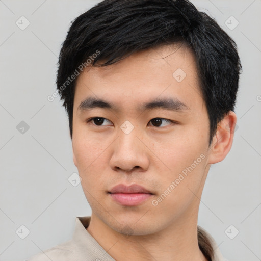 Neutral asian young-adult male with short  black hair and brown eyes