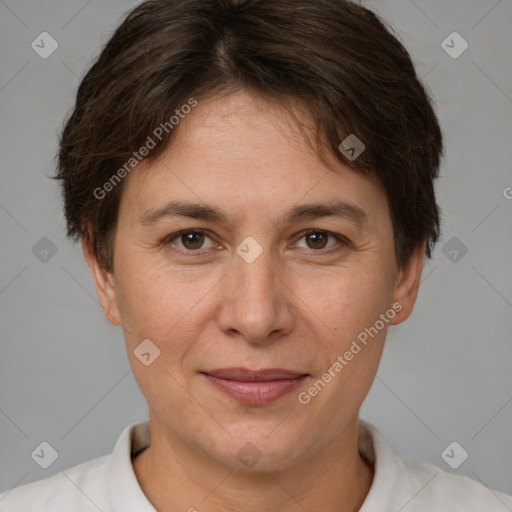 Joyful white adult female with short  brown hair and brown eyes